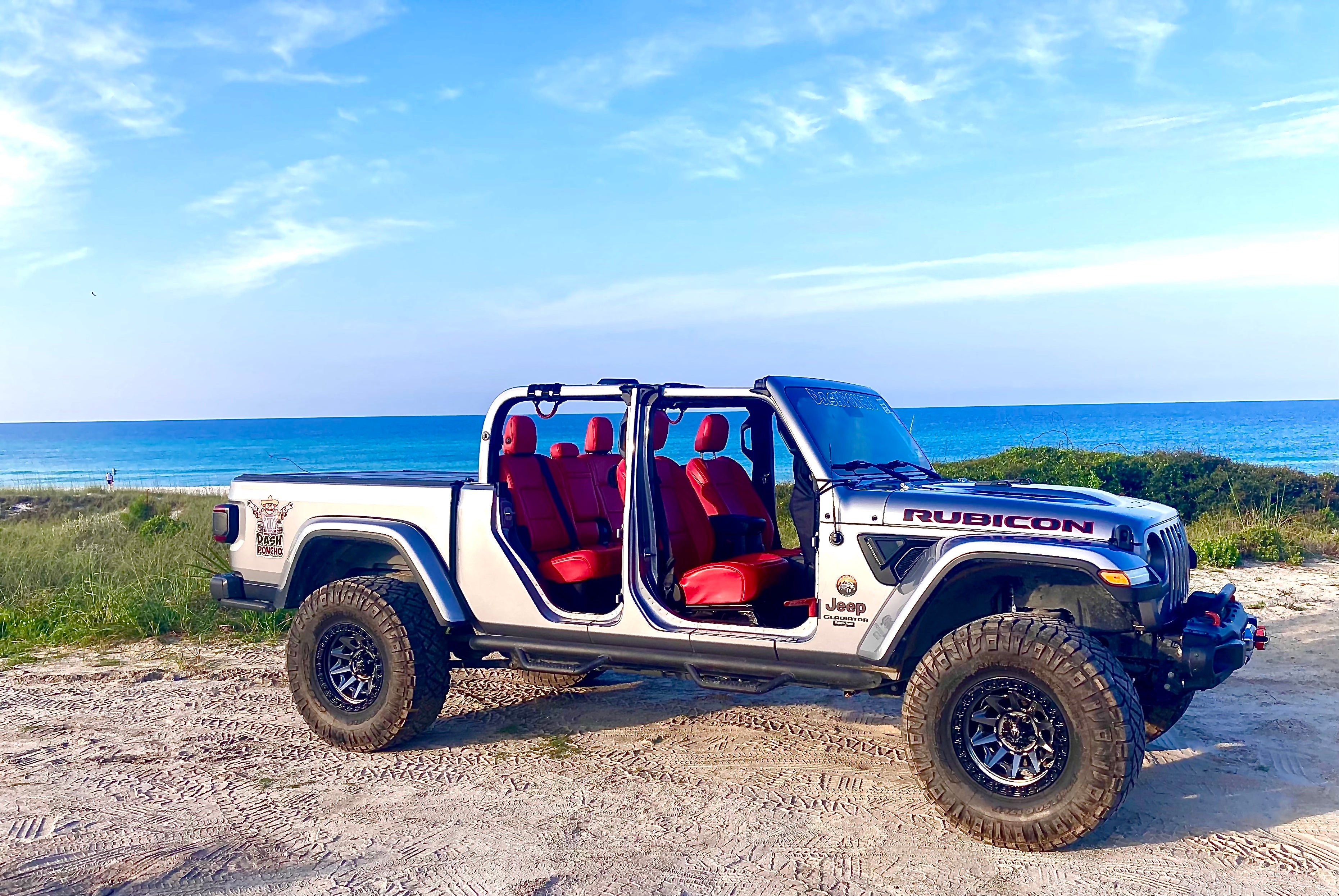 JT Jeep Gladiator Rubicon on the beach with Dash Poncho